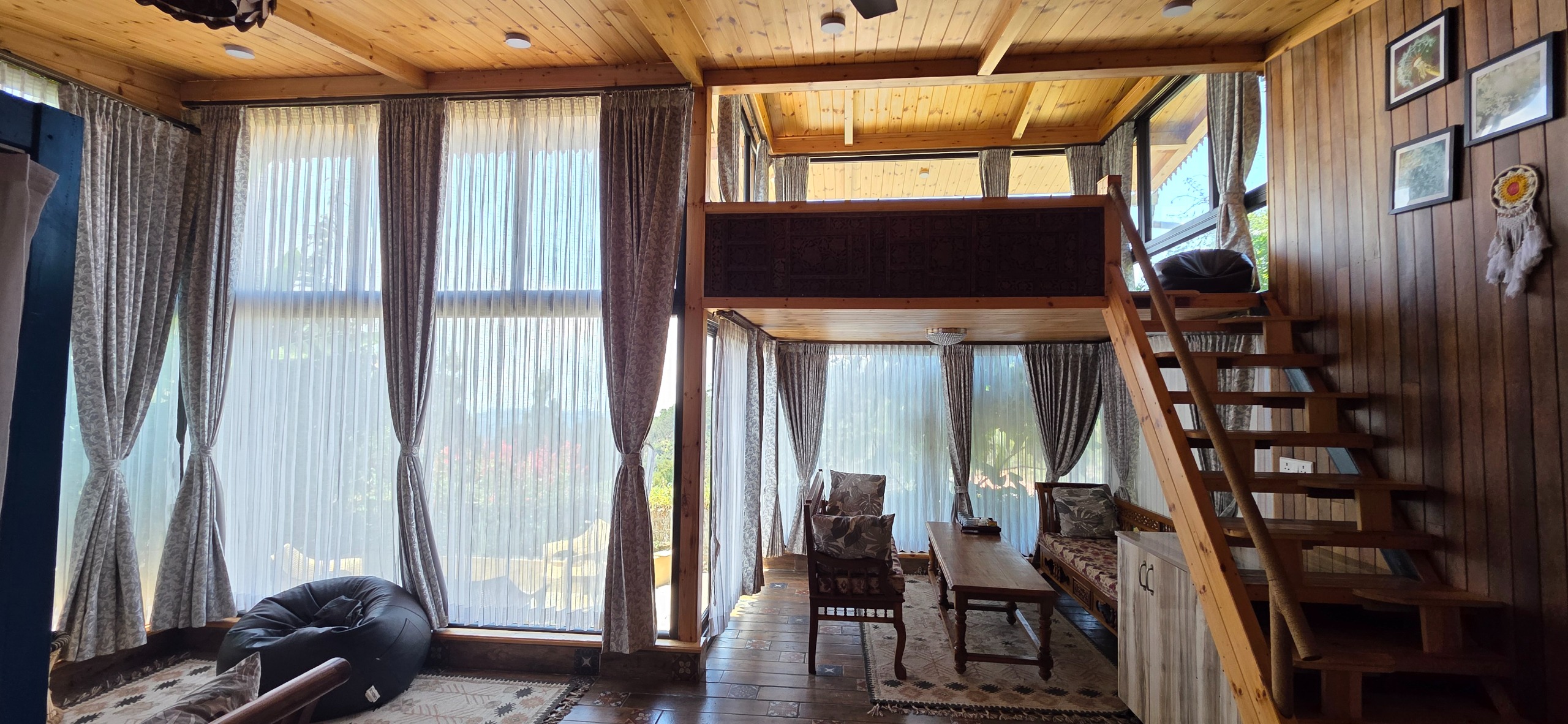 Spacious Alpine Woodhouse Living Room with Panoramic Valley Windows - Cloudwalks®